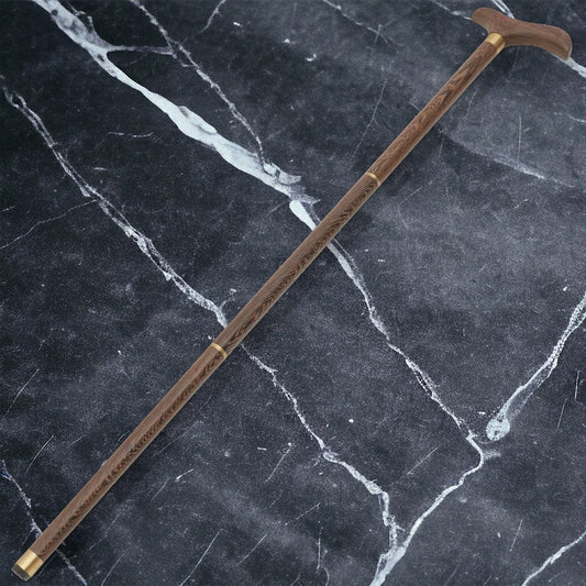 a wooden stick laying on a marble surface
